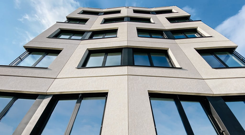 Referenz Dressler Bau GmbH - Mensch und Maschine