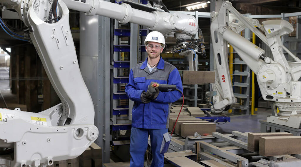 Magnesita - Mann vor Maschine